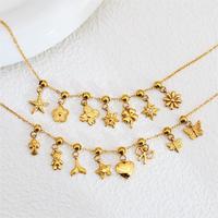 Collier Pendentif FY Fashion Jewelry Élégant en Acier Inoxydable Personnalisable avec Breloques Cœur, Croix, Étoile de Mer, Nœud Papillon, Trèfle et Fleur