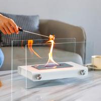Brasero de table rectangulaire en métal noir créatif en acier inoxydable avec dessus en verre et pierres décoratives