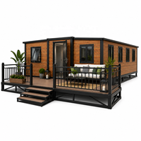 Maison préfabriquée de luxe en conteneur avec terrasse, maisonnette modulaire moderne pour hôtel-resort, jardin et projets résidentiels
