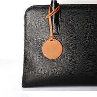 Étiquette de bagage ronde en cuir PU personnalisable, idéale pour valise, sac à main et accessoires – Nouvelle collection tendance pour femme