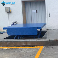 Plateforme élévatrice à ciseaux fixe robuste avec capacité de 1 à 20 tonnes, table de 1200x1200 mm pour le transfert de marchandises