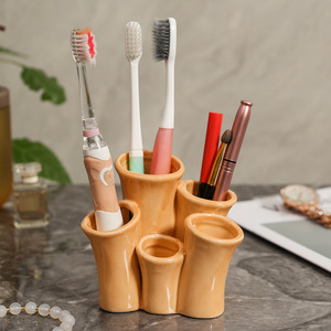 Soporte de cerámica para cepillos de dientes Ruijie, soporte de almacenamiento multifuncional para baño, escritorio, diseño moderno, forma redonda, independiente - Product Image 3