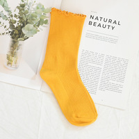 Chaussettes décontractées en dentelle de couleur unie pour filles Tube doux d'été/automne en coton/fibre de bambou brodé avec logo personnalisé et Midi