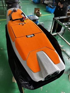 Planche de surf à moteur en fibre de carbone à prix d'usine avec batterie 48V, télécommande et sac pour le surf en mer - Product Image 1