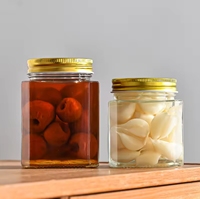 Verre clair vide de luxe 250ml 380ml 500ml unique de qualité alimentaire avec bouchon à vis Sauce chaude confiture miel bouteille pot pour le stockage des aliments