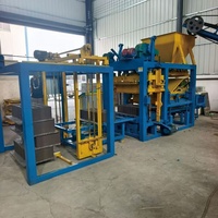 Machine à fabriquer des blocs entièrement automatique QT4-25 populaire sur le marché africain, équipement de fabrication de briques creuses en ciment à faible coût