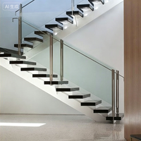 Escalier droit sur mesure de luxe avec poutre centrale dissimulée et marches en marbre/bois pour villa