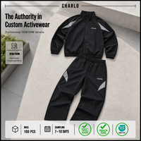 Ensemble de survêtement unisexe Charlo coupe-vent, tissu épais résistant à l'eau, coupe ample et oversize, vente en gros OEM GCC