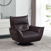 Fauteuil de salon moderne en cuir écologique, pivotant, avec structure en fer moulé sur mesure et pieds en acier carbone.