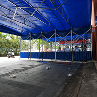 Auvent motorisé durable à pousser et tirer avec cadre en acier galvanisé, roues et couverture en PVC imperméable pour usine, atelier et exposition