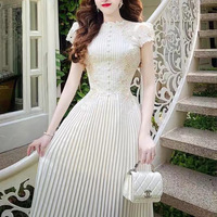 Robe d'été 2026 TKS en dentelle brodée pour femme, style élégant et taille ajustée
