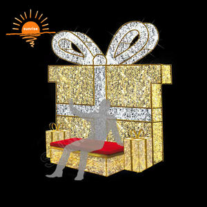 La silla grande navideña para exteriores del centro presenta un paseo decorativo a través de una caja de regalo con luz LED blanca cálida para Centro Comercial - Product Image 1