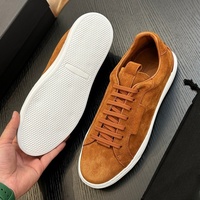 Chaussures de course pour hommes en cuir véritable respirantes avec semelle extérieure en caoutchouc, style couleur unie, rehaussantes