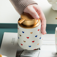 Distributeur de savon liquide en céramique rond moderne et durable, en stock, pour la maison, l'hôtel, la salle de bain