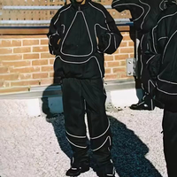 Ensemble de survêtement personnalisé en polyester et nylon pour homme, coupe oversize, coupe-vent, streetwear, veste et pantalon de haute qualité, vente en gros fabricant