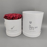 Boîtes cadeaux rondes en carton recyclé OEM avec finition en papier couché, design rose luxueux, emballage personnalisable