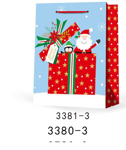 Sacs cadeaux en papier de Noël à cordon de serrage avec paillettes - Product Image 3