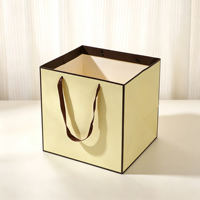 Sacs en papier personnalisés de luxe avec votre propre logo pour vêtements, sacs d'emballage pour boutique de vêtements rose mat avec poignées en ruban