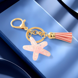 Porte-clés Étoile de mer en cristal avec pendentif pompon, impression UV couleur intégrale, pour sacs d'école et accessoires de clés pour femmes - Product Image 4