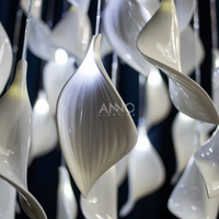 Lustre cascade vertical ANNO personnalisé en forme de feuille, luminaire suspendu pour hall d'hôtel de luxe et escalier de villa