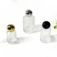Nouvelle conception de flacon de parfum en verre vide de luxe pour soins de la peau, cylindre rond de 30 ml, 50 ml, 100 ml, flacon d'huile essentielle
