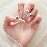 Ongles à presser OEM ODM, forme Stiletto longue, réutilisables, effet œil de chat, strass, French Manucure pour Salon