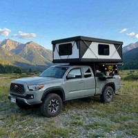 Camper tout-terrain sur mesure en acier avec toit rigide, abri imperméable pour benne de pick-up