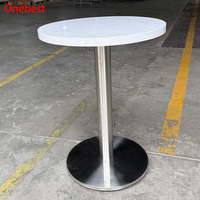 Table de bar contemporaine en surface solide avec base en acier inoxydable, petites tables à manger rondes modernes en marbre