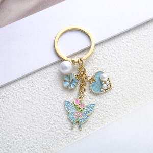 Porte-clés exquis en gros avec pendentifs papillon, fleur, coeur et perle - Product Image 6