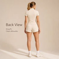 Ensemble deux pièces sportif beige pour femme avec bordure contrastante et demi-fermeture éclair, coupe ajustée personnalisée, tenue athlétique décontractée, vente en gros