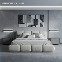 Lit Modulaire Minimaliste Haute Confort avec Rembourrage Effet Galet, Tissu Doux et Capitonnage, Cadre de Lit King Size pour un Confort Luxueux