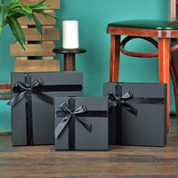 Offre Spéciale emballage de parfum de luxe personnalisé boîte de papier cadeau noir affaires Kraft matériel avec nœud ruban emballage de cadeau d'affaires