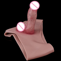 Pantalon de gode portable flexible creux en silicone de nouvelle conception pour l'amélioration masculine et la satisfaction sexuelle