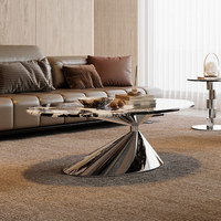 Table basse ovale en marbre noir au design elliptique, base en piédestal chromé, acier inoxydable stable pour salon, hôtel, villa