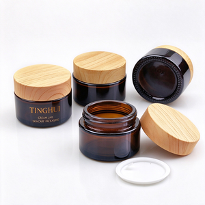Tarro de vidrio ámbar de 5g 10g 15g 20g 30g 50g con logotipo personalizado, tapa imitación madera, envase vacío para productos de cuidado de la piel, para bálsamo labial y manteca corporal. - Product Image 1