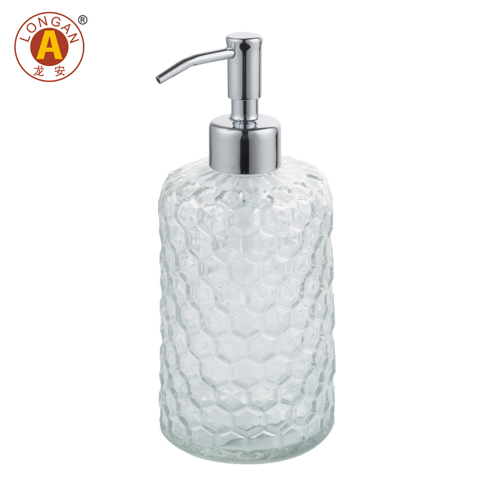 Clear glass bottle with matte lotion pump