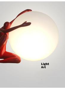 Lampe de table en résine sculptée en forme d'être humain assis de style nordique, moderne, tenant <span class=keywords><strong>la</strong></span> boule, lampe de chevet en fibre de verre pour <span class=keywords><strong>la</strong></span> lecture - Product Image 2