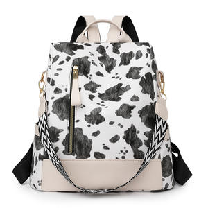 Mochila de viaje antirrobo con patrón de vaca de estilo coreano para mujer, bolso de hombro ligero de PU resistente al agua para ir al trabajo - Product Image 5
