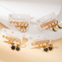 Nouvel ensemble de boucles d'oreilles clous plaquées or en gros pour femmes, boucles d'oreilles étoiles en métal creux, bijoux, boucles d'oreilles en acier inoxydable
