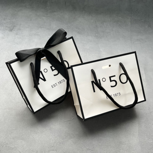 Custom Black Border Paper Bags with Ribbon Bow - Elegant Packaging for Cosmetics & Jewelry For Small Business - Product Image 1