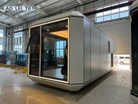Mécanisme d'amarrage modulaire de luxe moderne mobile préfabriqué Protection de l'environnement Space Capsule House pour salon et bureau