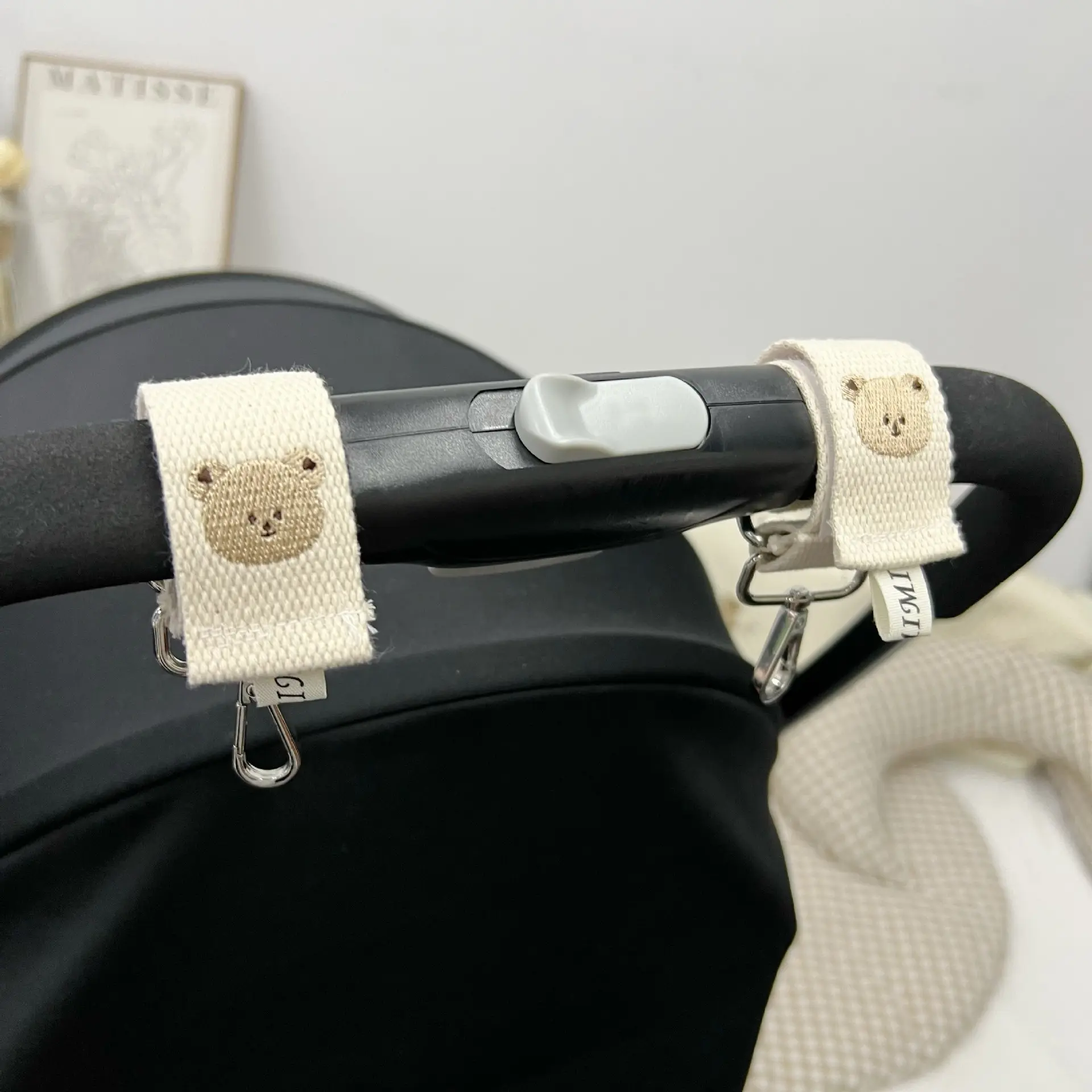 Accessoires de sac suspendus universels de conception mignonne crochet de poussettes de bébé pour les poussettes attaches de crochet et de boucle de tissu de poussette