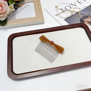 Peigne à cheveux élégant avec nœud, mini brosse décorative en alliage et acétate pour usage quotidien avec fonction de massage capillaire - Product Image 2