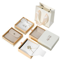 Vente en gros d'ensemble de boîtes d'emballage de bijoux boîte à bijoux en deux parties avec pochette à bouton-pression et sac en velours pour le stockage