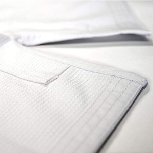 Fabricante al por mayor blanco Jiu Jitsu BJJ GI Judo Karate Unisex MMA uniformes diseño personalizado OEM disponible para adultos - Product Image 3