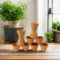 Petit pot de fleur en terre cuite de 2 pouces en céramique pour la maison, le jardin et la pépinière.