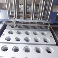 Machine de remplissage et de scellage automatique de capsules de café Nespresso