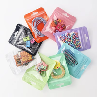 Sacs à bijoux en plastique personnalisés, pochette de machine de fête souple transparente givrée avec logo imprimé fourre-tout transparent caractérisé par des matériaux recyclés