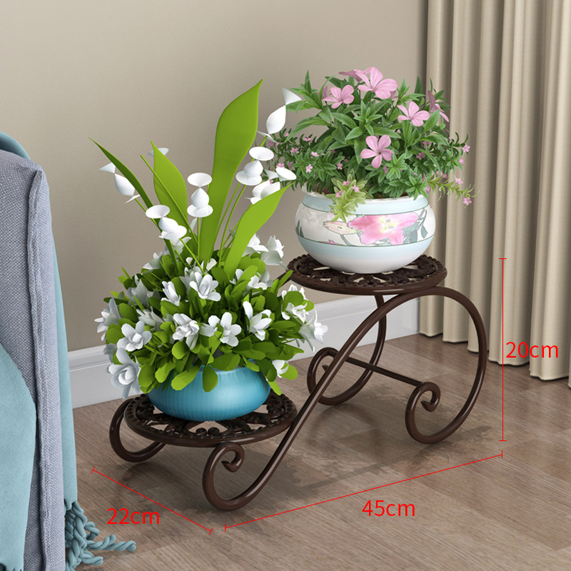 Two-tiered flower stand; bronze