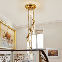 Lustre long européen en laiton de luxe avec pendentifs en cristal français pour escalier, luminaire suspendu en grappe